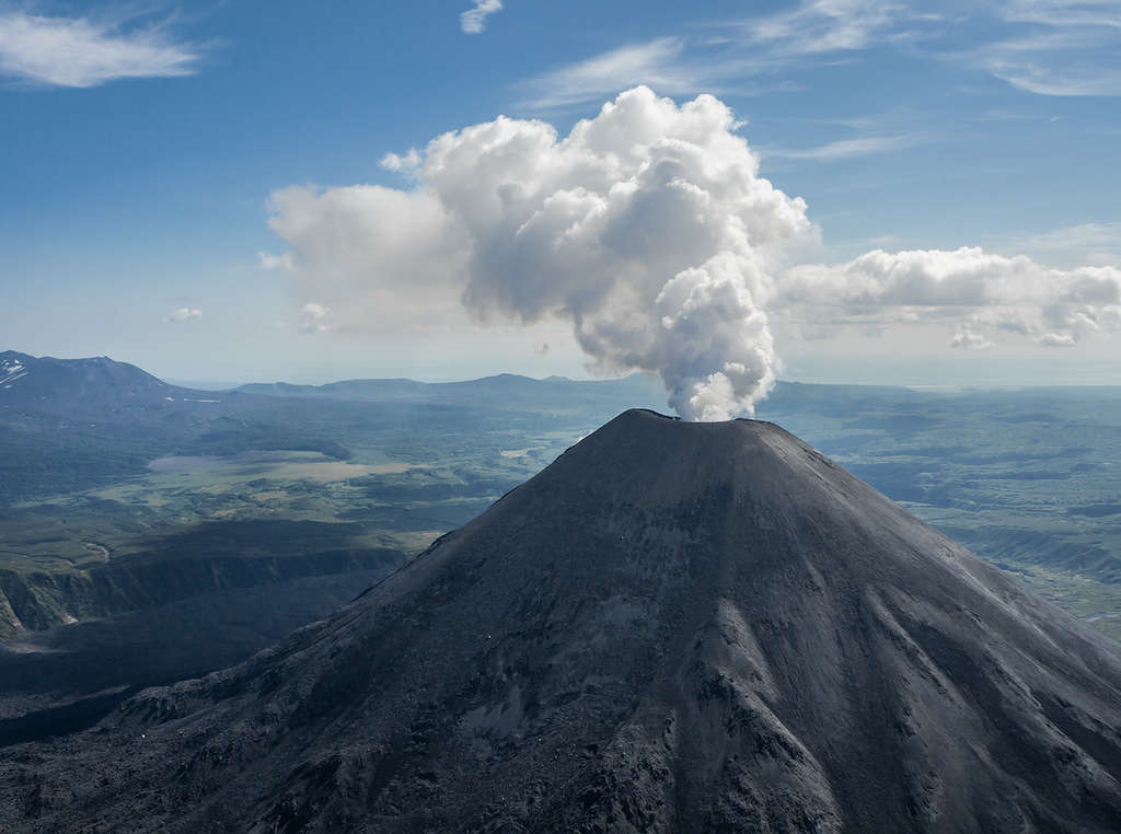 Karymskaya Sopka (the Karymsky Volcano) is a restless volcano in Kamchatka's eastern zone. This stra...